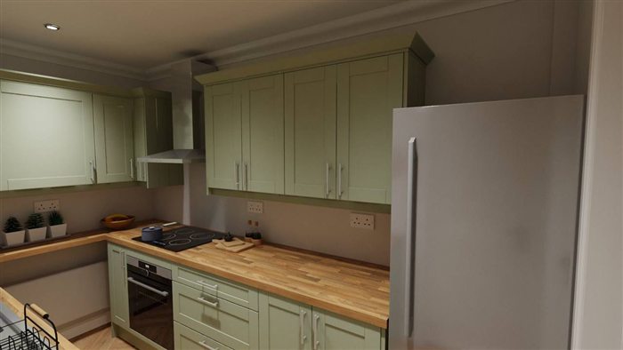 Green shaker kitchen with oak worktops