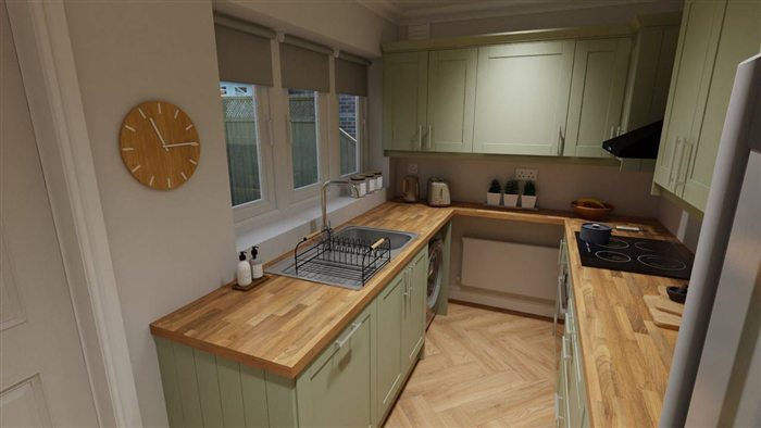 Green shaker kitchen with oak worktops